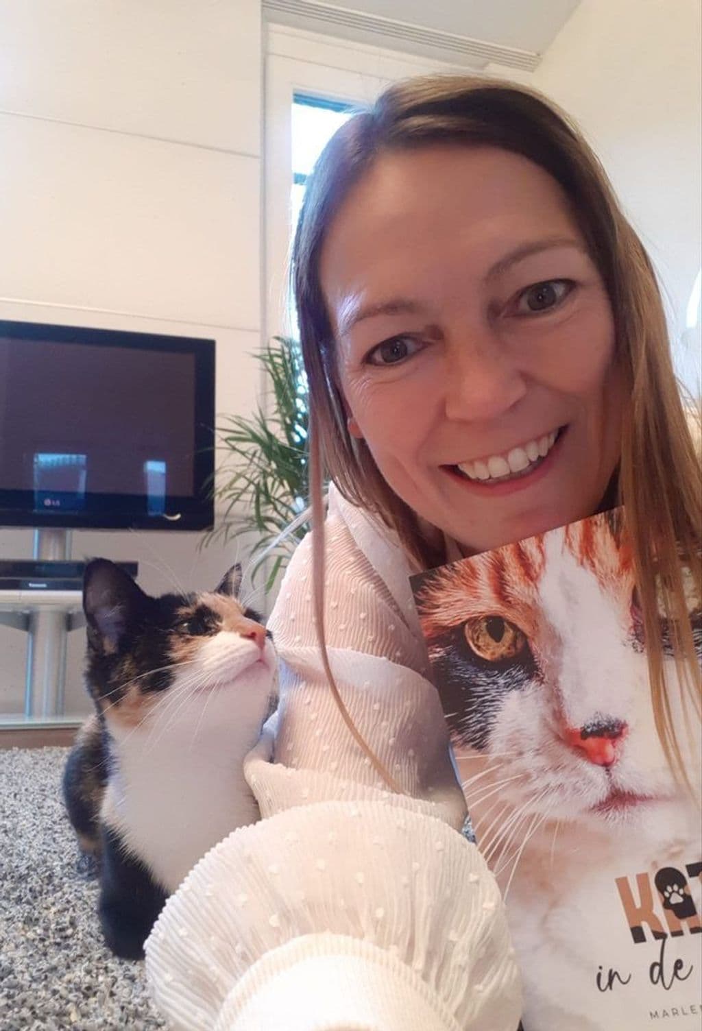 Marlen met Obi en boek2.jpg